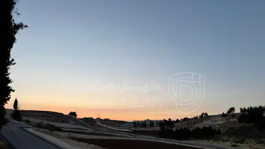 أرض في بلعاس - يبعد 6 دقائق عن طريق المطار - 177,000 دأ - صورة NaN